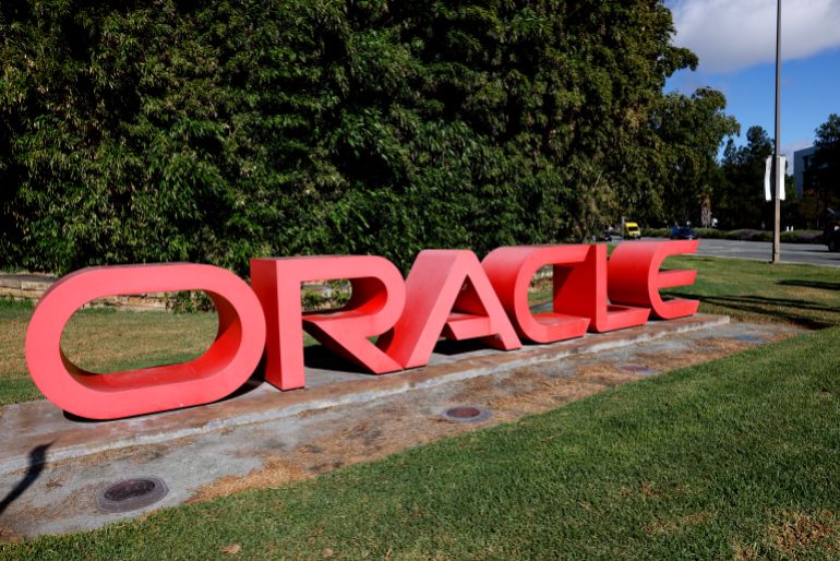 epa_68d8707c36da-1759015036 epa12368656 Oracle signage is displayed at the entrance to the former headquarters and current offices of Oracle in Redwood City, California, USA, 10 September 2025. Oracle’s co-founder, and chairman Larry Ellison, briefly soared past Elon Musk as the world’s richest person for the first time as shares in Oracle surge more than 40 percent on Wednesday. Media reports that Oracle has shed more than 3,000 jobs globaly in recent weeks. Salesforce, Oracle and Google are laying off employees as part of a restructurings and shift particularly towards artificial intelligence. EPA/JOHN G. MABANGLO