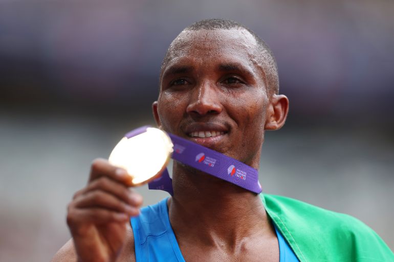 TOKYO, JAPAN - SEPTEMBER 15: Gold medalist Alphonce Felix Simbu of Team United Republic of Tanzania poses for a photo with his medal after winning the Men's Marathon during day three of the World Athletics Championships Tokyo 2025 at National Stadium on September 15, 2025 in Tokyo, Japan. (Photo by Cameron Spencer/Getty Images)