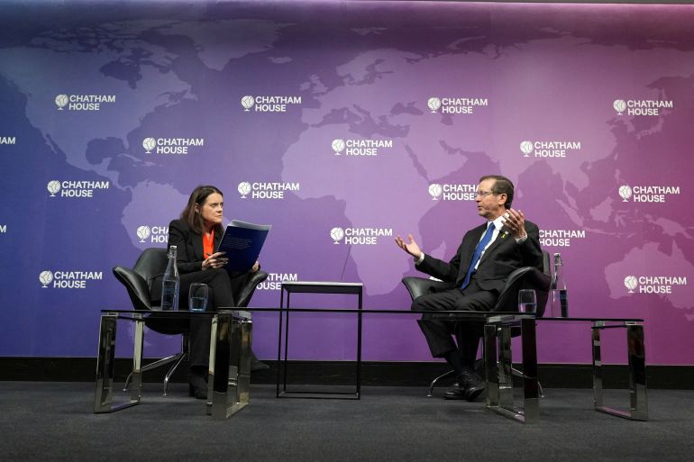 Israel's President Isaac Herzog speaks to chair Bronwen Maddox during an event called 'In conversation with Isaac Herzog' at Chatham House in London, Britain, September 10, 2025. Alastair Grant/Pool via REUTERS