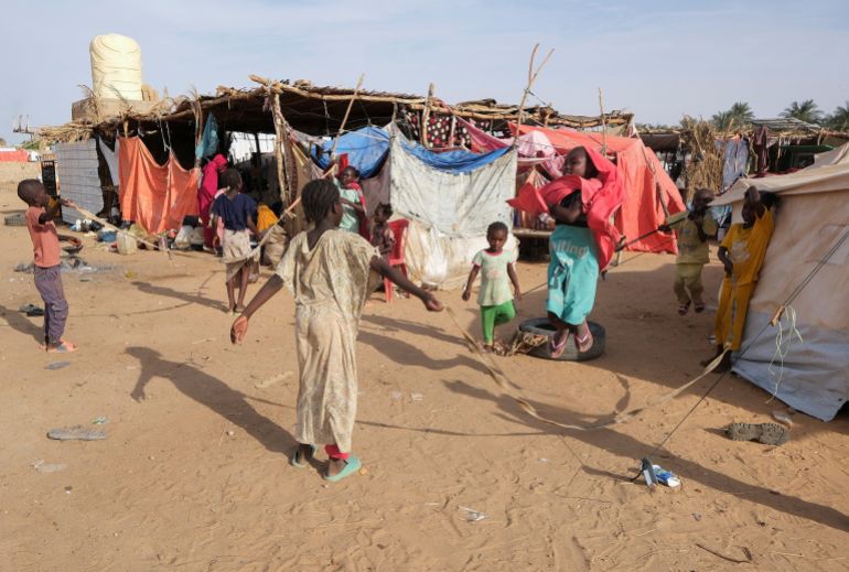 Displaced Sudanese girls, who fled intense fighting in al-Fashir, play at a displacement camp, as the humanitarian situation deteriorates amid the ongoing conflict between the paramilitary Rapid Support Forces (RSF) and the Sudanese army, in Al Dabba, Sudan, September 6, 2025. REUTERS/El Tayeb Siddig