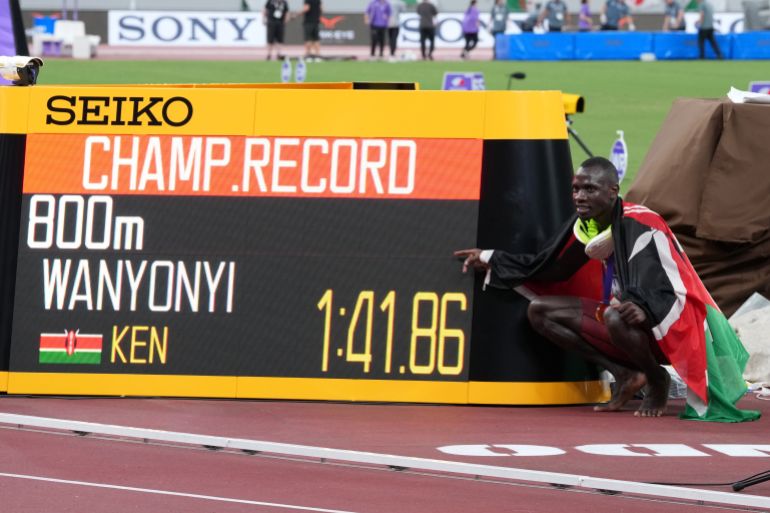 Sep 20, 2025; Tokyo, Japan; Emmanuel Wanyonyi (KEN) poses with his time after winning the mens 800m final at National Stadium. Mandatory Credit: Kirby Lee-Imagn Images