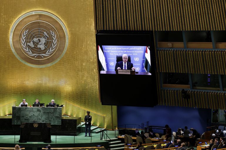 reuters_68d54bee-1758809070-1 Palestinian President Mahmoud Abbas appears on a screen as he addresses the 80th United Nations General Assembly (UNGA), at the U.N. headquarters in New York, U.S., September 25, 2025. REUTERS/Jeenah Moon