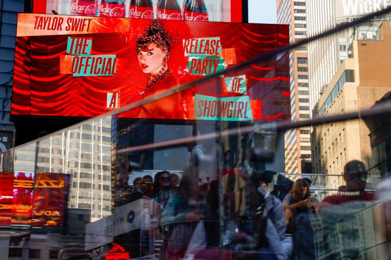 2bum-1760440776 A billboard advertises "The Official Release Party of a Showgirl," a movie celebrating Taylor Swift’s new album "The Life of a Showgirl," in Times Square in New York City, U.S., October 3, 2025. REUTERS/Kylie Cooper