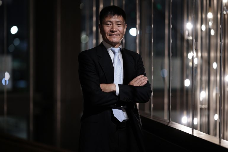 Zhou Fengsuo, a Chinese activist who was a student leader during the 1989 Tiananmen protests, poses for a portrait during an International Federation for Human Rights meeting in Bogota, Colombia, Monday, Oct. 27, 2025. (AP Photo/Ivan Valencia)