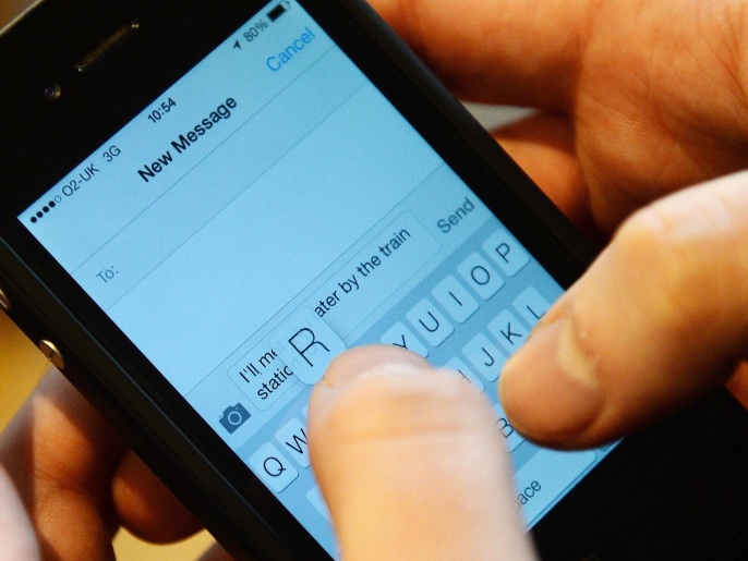 A person writes a text on a mobile phone in London, Britain, 17 January 2014. According to news reports citing top secret documents, the National Security Agency (NSA) allegedly collects some 200 million text messages and other personal data from mobile phones around the globe every day under an NSA programme codenamed 'Dishfire'.