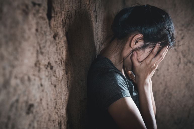 Young depressed woman, domestic violence and rape. stop abusing violence, human trafficking, stop violence against women, Human is not a product. Stop women abuse, Human rights violations.