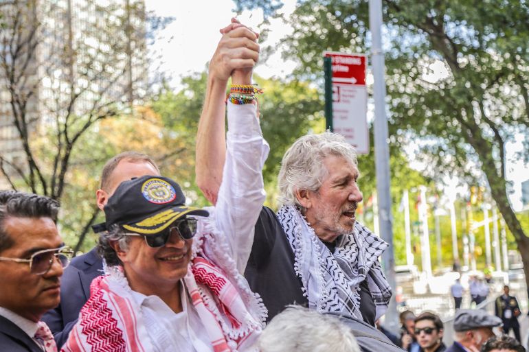 Handout picture released by Colombian Presidency shows Colombia's President Gustavo Petro and British singer-songwriter Roger Waters addressing a pro-Palestinian rally outside the UN headquarters in New York on September 26, 2025.