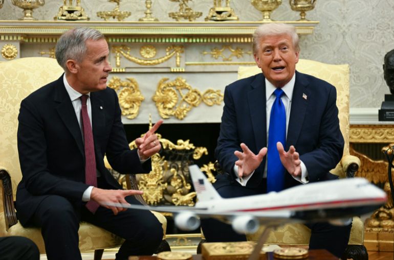 afp_68e5402e0bdb-1759854638 US President Donald Trump meets with Canadian Prime Minister Mark Carney in the Oval Office of the White House in Washington, DC, on October 7, 2025. (Photo by Jim WATSON / AFP)