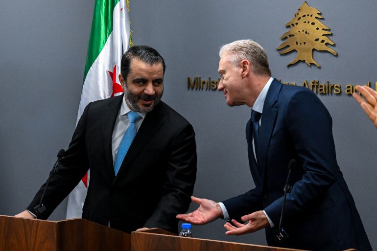 afp_68f122cdbf59-1760633549 Lebanon's Foreign Minister Youssef Rajji and his Syrian counterpart Asad al-Shaibani attend a joint press conference following their meeting in Beirut on October 10 2025. (Photo by JOSEPH EID / AFP)
