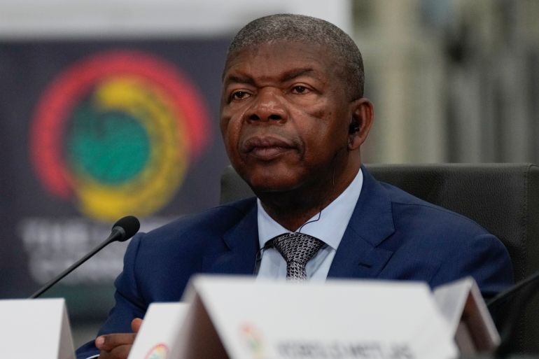 ap_685ce9b76a2c3-1750919607 Angola's President Joao Lourenco participates in the Lobito Corridor Trans-Africa Summit at the Carrinho food processing factory near Lobito, Angola, on Wednesday, Dec. 4, 2024. (AP Photo/Ben Curtis)