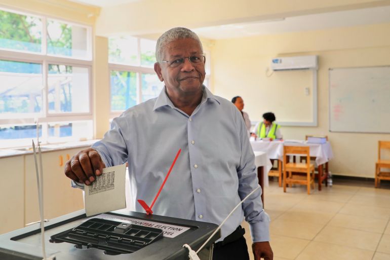 ap_68eb34e44a00e-1760244964 President Wavel Ramkalawan casts his vote in a runoff presidential election between him and opposition challenger Patrick Herminie, at Belonie Secondary School in St Louis, Mahe, Seychelles, Saturday, Oct. 11, 2025. (AP Photo/Emilie Chetty)