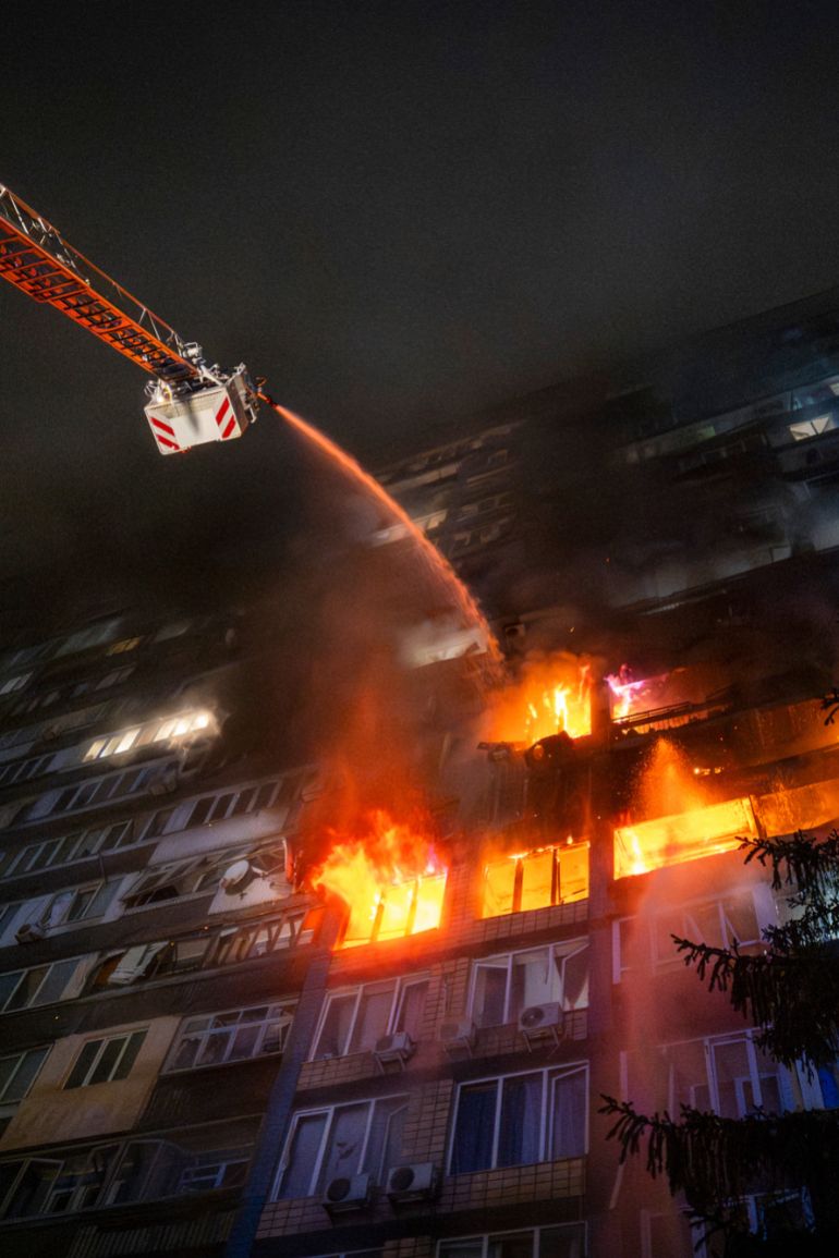 FILE - Emergency services personnel work to extinguish a fire following a Russian attack in Kyiv, Ukraine, Friday, Oct. 10, 2025. (AP Photo/Dan Bashakov, File)