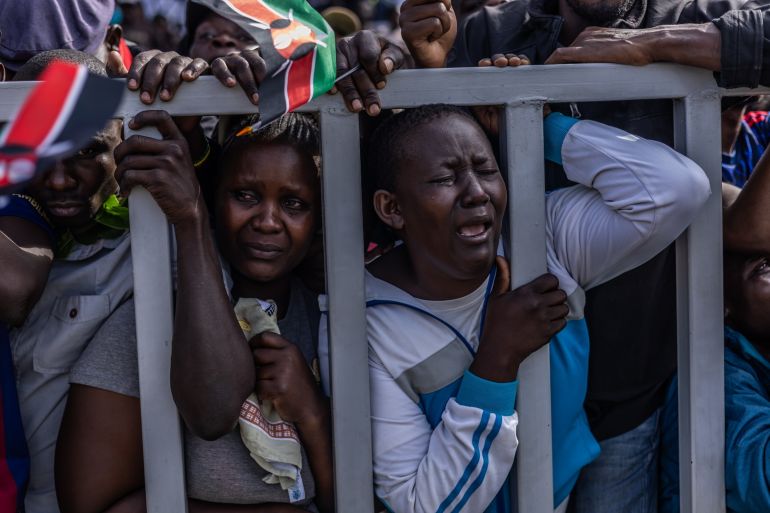 ap_68f4fa4e7f989-1760885326 People react during the viewing of the body of former Kenya Prime Minister Raila Odinga at Jomo Kenyatta Stadium in Kisumu, Kenya, Saturday, Oct. 18, 2025. (AP Photo/Samson Otieno)
