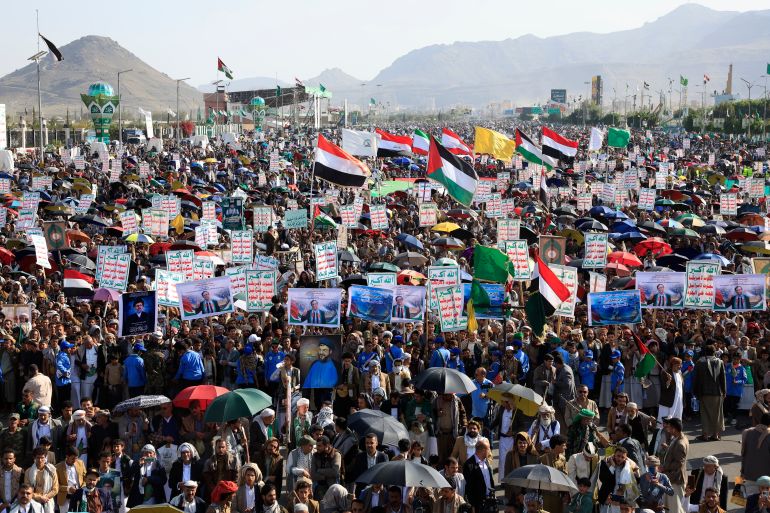 epa12428447 Houthi supporters hold placards and wave flags during a protest against the Israel-Palestine conflict, in Sana'a, Yemen, 03 October 2025. Thousands of Houthi supporters gathered for their weekly protest in solidarity with the Palestinian people and to condemn Israel's actions in Gaza. The protest came a day after the Houthi leader Abdul-Malik al-Houthi claimed in a televised speech that his forces had attacked 228 Israel-linked ships in the water around Yemen since November 2023 in retaliation for Israel's military campaign in the Gaza Strip. EPA/YAHYA ARHAB