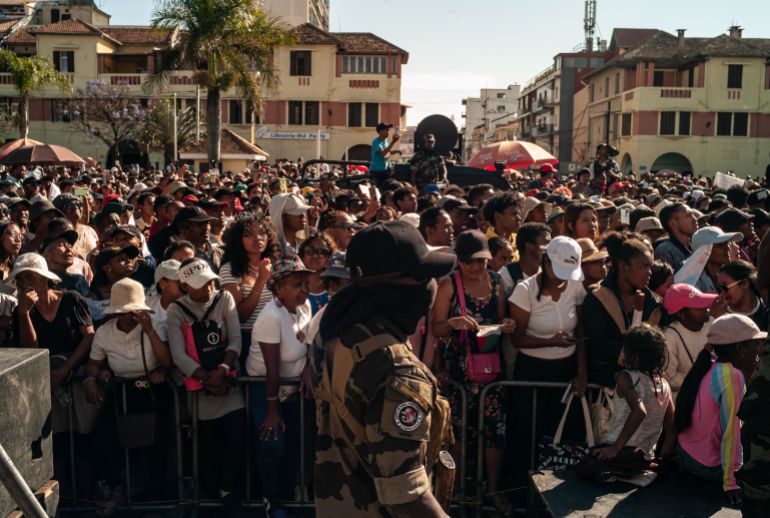epa_68efb5d8f196-1760540121 epa12453685 Protesters cheer during a rally in Antananarivo, Madagascar, 14 October 2025. Madagascar's president Andry Rajoelina has confirmed he has fled the country during an address to the nation on social media after CAPSAT, an elite military unit, joined the protesters over the weekend. He has also announced the dissolution of the Malagasy National Assembly. EPA/HENITSOA RAFALIA