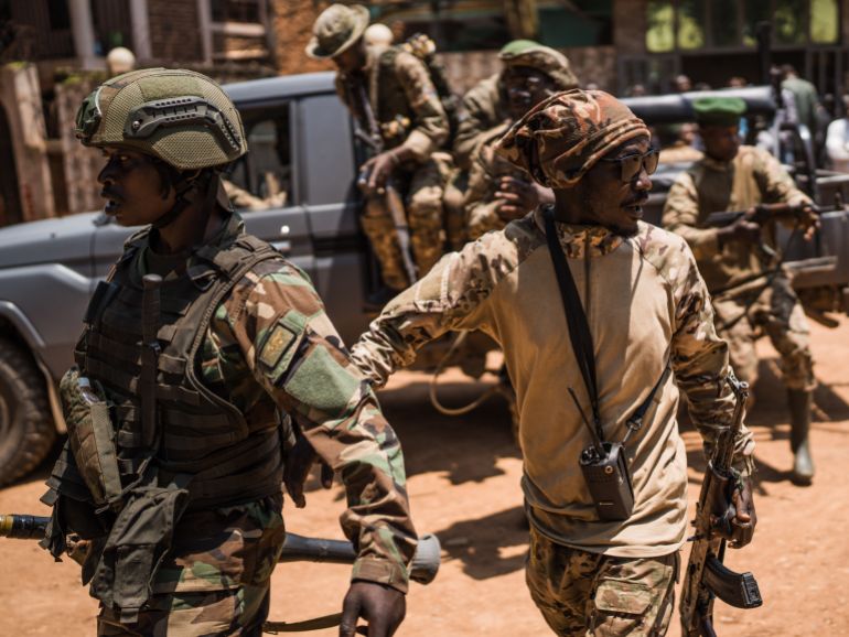 BUKAVU, DEMOCRATIC REPUBLIC OF CONGO - FEBRUARY 22: M23 rebels guard a unit of surrendering Congolese police officers who will be recruited into the rebel group on February 22, 2025 in Bukavu, Democratic Republic of Congo. The Rwandan-backed rebel group M23 swept into Bukavu over the weekend, taking control of the city with a population of approximately one million people in Democratic Republic of the Congo's (DRC) South Kivu Province. Hundreds of thousands of people in the eastern part of the DRC have been displaced as the rebel group has made swift advances against Congolese pro-government forces in recent weeks. (Photo by Hugh Kinsella Cunningham/Getty Images)