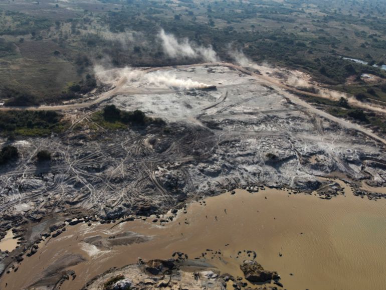 KOLWEZI, DEMOCRATIC REPUBLIC OF CONGO - MAY 24: An aerial view reveals the environmental toll of artisanal cobalt and copper mining on May 24, 2025 in Kolwezi, Democratic Republic of Congo. The landscape is scarred by open pits and pools of contaminated runoff, a visible consequence of the booming demand for clean energy minerals. (Photo by Michel Lunanga/Getty Images)