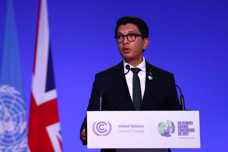 GLASGOW, SCOTLAND - NOVEMBER 02: Madagascar's President Andry Rajoelina makes a national statement during day three of COP26 at SECC on November 2, 2021 in Glasgow, United Kingdom. 2021 sees the 26th United Nations Climate Change Conference. The conference will run from 31 October for two weeks, finishing on 12 November. It was meant to take place in 2020 but was delayed due to the Covid-19 pandemic. (Photo by Adrian Dennis - Pool/Getty Images)