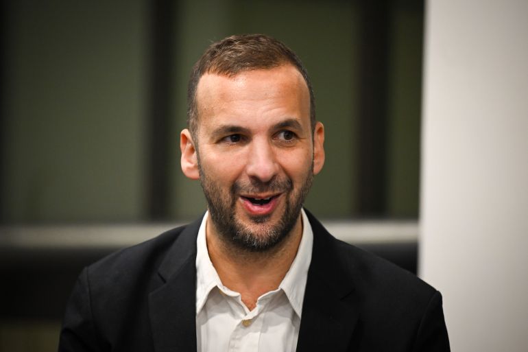 BOURNEMOUTH, ENGLAND - OCTOBER 05: Green Party leader Zack Polanski is interviewed by a member of the media on the final day of the Green Party Conference, at Bournemouth International Centre on October 05, 2025 in Bournemouth, England. The Green Party go into this year's conference with new leader Zack Polanski and will focus on the cost-of-living, climate crises and the NHS. (Photo by Finnbarr Webster/Getty Images)