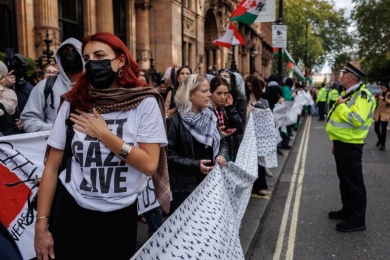 LONDON, ENGLAND - OCTOBER 7: Protesters from a number of London universities attend a pro-Palestine demonstration on October 7, 2025 in London, England. On the same day as people mark the second anniversary of the Hamas attacks on Israel which led to more than 1200 deaths and 251 hostages taken, students from King's College London, London School of Economics, University College London, and School of Oriental and ­African Studies (SOAS) take part in a march through central London to mark two years since 'the beginning of the genocide in Gaza'. This march comes as Home Secretary Shabana Mahmood announced increased police powers at repeat protests, such as those in support of Palestine. (Photo by Dan Kitwood/Getty Images)