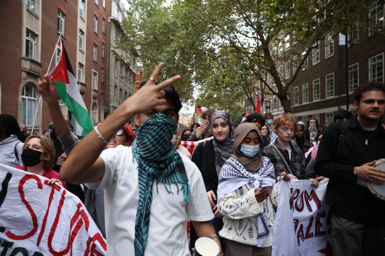 LONDON, ENGLAND - OCTOBER 7: Protesters from a number of London universities attend a pro-Palestine demonstration on October 7, 2025 in London, England. On the same day as people mark the second anniversary of the Hamas attacks on Israel which led to more than 1200 deaths and 251 hostages taken, students from King's College London, London School of Economics, University College London, and School of Oriental and ­African Studies (SOAS) take part in a march through central London to mark two years since 'the beginning of the genocide in Gaza'. This march comes as Home Secretary Shabana Mahmood announced increased police powers at repeat protests, such as those in support of Palestine. (Photo by Dan Kitwood/Getty Images)