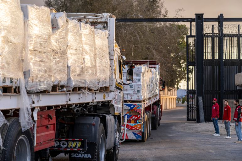 RAFAH, EGYPT - OCTOBER 12: Trucks carrying aid enter Gaza through the border crossing on October 12, 2025 in Rafah, Egypt. This week's ceasefire deal between Israel and Hamas has brought an end to the two years of war that followed the attacks of Oct. 7, 2023, allowing aid groups to increase delivery of humanitarian relief. (Photo by Ali Moustafa/Getty Images)