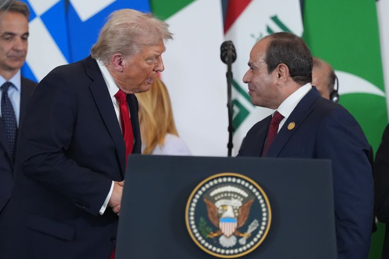 getty_68ed39406d-1760377152 SHARM EL-SHEIKH, EGYPT - OCTOBER 13: President Donald Trump speaks with Egypt's President Abdel-Fattah el-Sissi during a summit of European and Middle Eastern leaders on Gaza on October 13, 2025 in Sharm El-Sheikh, Egypt. President Trump is in Egypt to meet with European and Middle Eastern leaders in what’s being billed as an international peace summit, following the start of a US-brokered ceasefire deal to end the war in the Gaza Strip. (Photo by Evan Vucci - Pool / Getty Images)