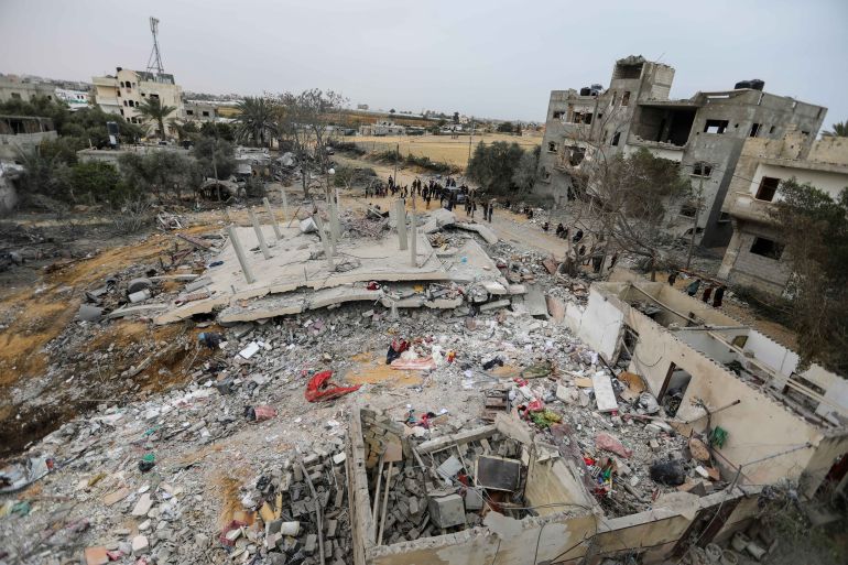 gettyimages-2121836993-1760970718 RAFAH, GAZA - MARCH 29: People inspect damage and recover items from their homes following Israeli air strikes on March 29, 2024 in Rafah, Gaza. Despite warnings from US President Biden, Israeli forces have targeted the city of Rafah which is currently home to an estimated million Palestinian refugees. According to Gaza's Ministry of Health, more than 32,000 Palestinians have been killed, and over 74,000 wounded in Israel's ongoing bombardment of Gaza starting on October 7. (Photo by Ahmad Hasaballah/Getty Images)