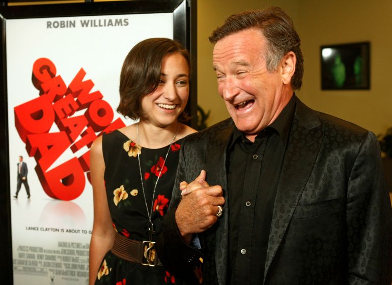 pic-88542-1759939712 Actor Robin Williams, star of the film "World's Greatest Dad", poses with his daughter Zelda at the film's premiere in Los Angeles, California August 13, 2009. REUTERS/Fred Prouser (UNITED STATES ENTERTAINMENT)