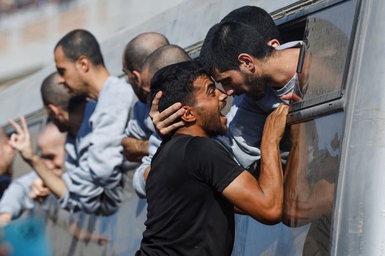 re-2-1760360363-1 A man greets a freed Palestinian prisoner released by Israel as part of a hostages-prisoners swap and a ceasefire deal between Hamas and Israel, in Khan Younis in the southern Gaza Strip, October 13, 2025. REUTERS/Mahmoud Issa
