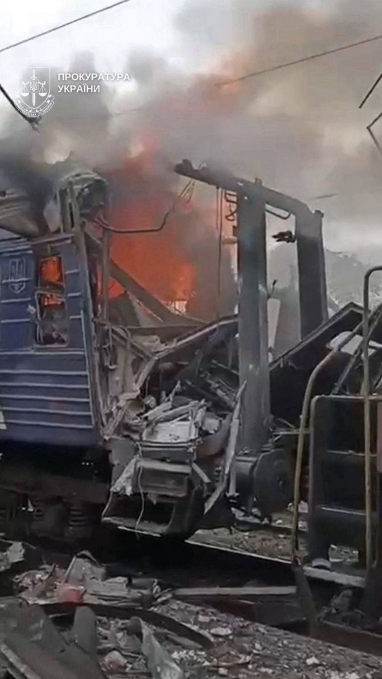 reuters_68e11fee-1759584238 A train burns after being hit by the Russian drone strike, amid Russia's attack on Ukraine, at the railway station in Shostka, Sumy region, Ukraine October 4, 2025. Prosecutor General's Office via Telegram/Handout via REUTERS THIS IMAGE HAS BEEN SUPPLIED BY A THIRD PARTY MANDATORY CREDIT. BEST QUALITY AVAILABLE