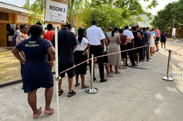 reuters_68eb3427-1760244775 People queue to cast their ballots during the presidential runoff election, after no candidate secured the required 50% majority in the first round held on September 27, in Victoria, Seychelles, October 9, 2025. REUTERS/Gabriel Robert-Gironcelle