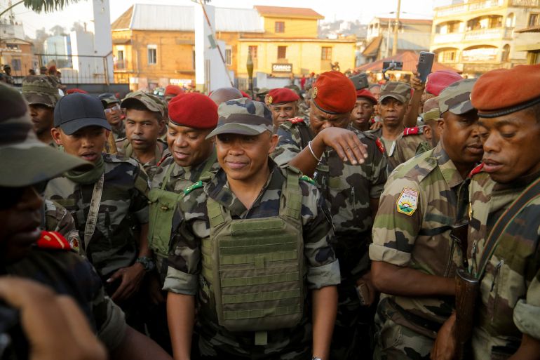 reuters_68ef64ee-1760519406 Malagasy military base welcomes Colonel Michael Randrianirina after he says he takes power during a nationwide youth-led protest over frequent power outages and water shortages, in Antananarivo, Madagascar, October 14, 2025. REUTERS/Zo Andrianjafy
