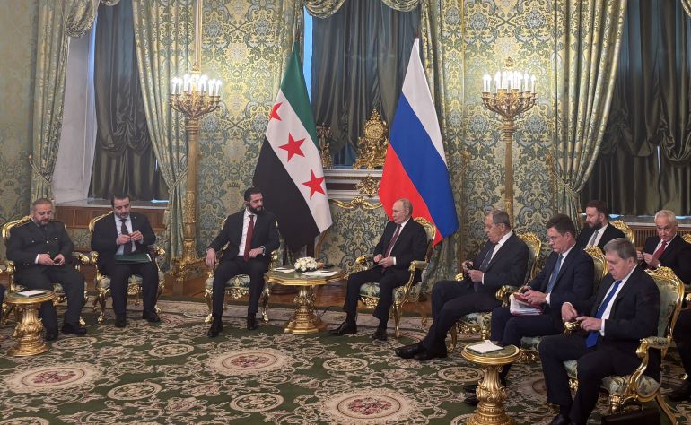reuters_68ef8c79-1760529529 Members of the delegations, led by Russia's President Vladimir Putin and Syria's President Ahmed al-Sharaa, attend a meeting at the Kremlin in Moscow, Russia, October 15, 2025. REUTERS/Vladimir Soldatkin