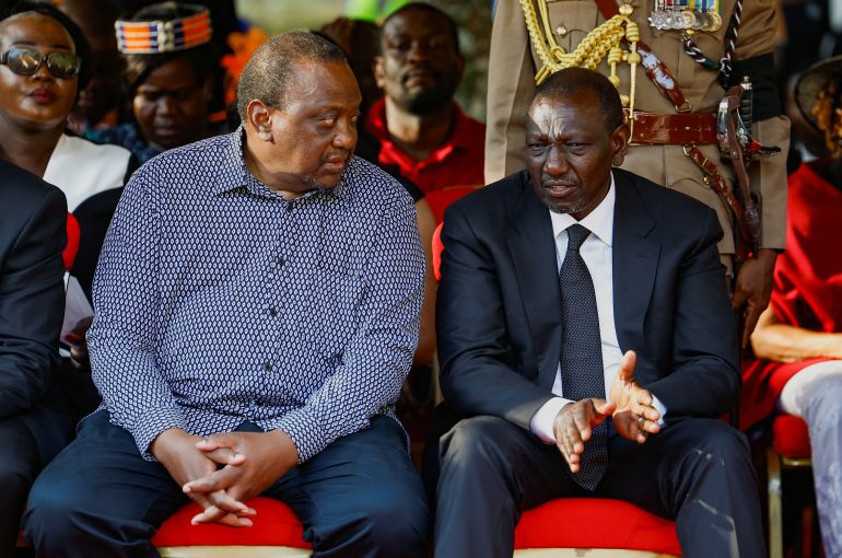 reuters_68f4f9b3-1760885171 Kenya's President William Rutto and Kenya's former President Uhuru Kenyatta speak as they attend the burial of Kenya's former Prime Minister Raila Odinga, who died while receiving medical treatment in India, at the Kango Ka Jaramogi home in Bondo, Siaya County, Kenya, October 19, 2025. REUTERS/Thomas Mukoya