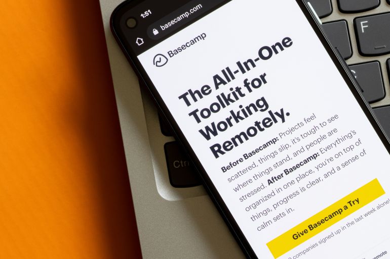 Portland, OR, USA - Oct 20, 2021: Homepage of Basecamp.com is seen on a smartphone. Basecamp is an online collaboration app that lets users manage their work together and communicate with one another.; Shutterstock ID 2065729010; purchase_order: aj; job: ; client: ; other: