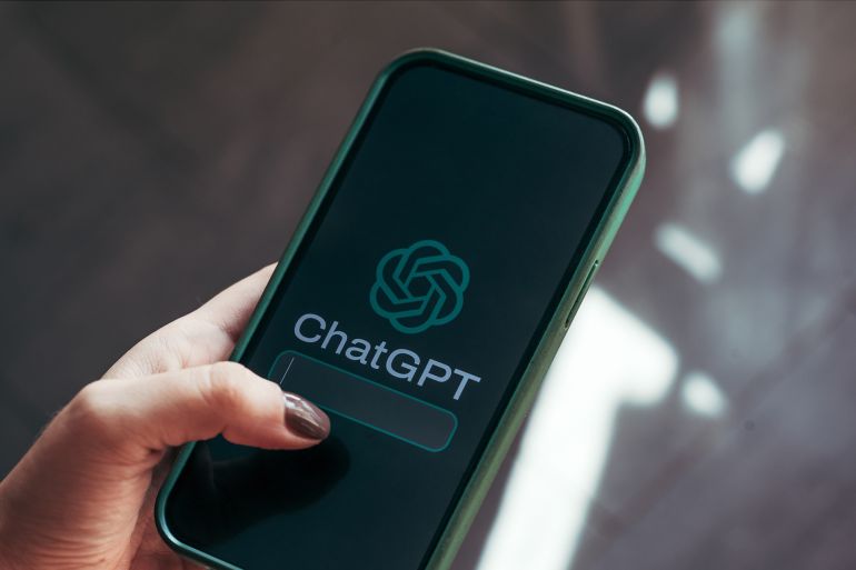 woman's hand holding a smartphone with ChatGPT logo, on the screen. Chat GPT is an artificial intelligence chatbot application developed in 2022 by OpenAI; Shutterstock ID 2368379425; purchase_order: aj; job: ; client: ; other: