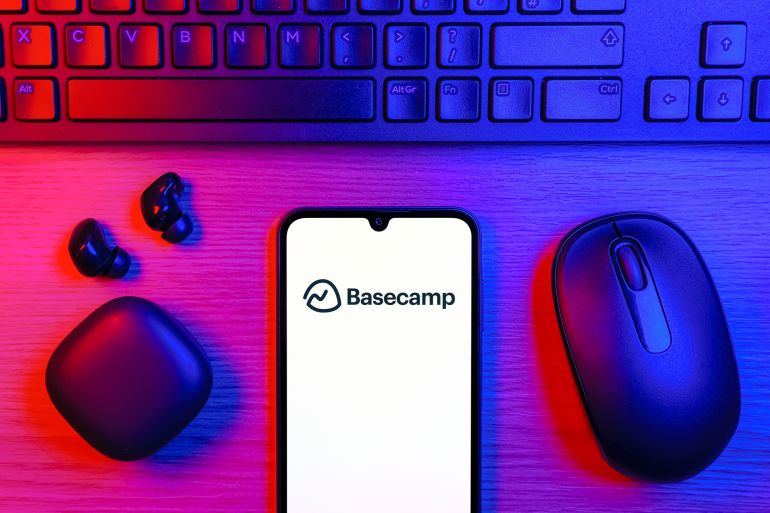 Prague, Czechia - 10 21 2024: Smartphone on surface showing Basecamp logo.; Shutterstock ID 2588422589; purchase_order: aj; job: ; client: ; other: