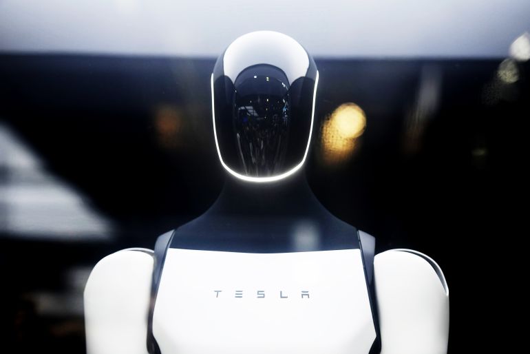 SHANGHAI, CHINA - JULY 28 2025: An Optimus humanoid exhibited by Tesla at the World Artificial Intelligence Conference in Shanghai, China Monday, July 28, 2025. The robot is scheduled to be available to customers this year. (Photo credit should read LONG WEI / Feature China/Future Publishing via Getty Images)