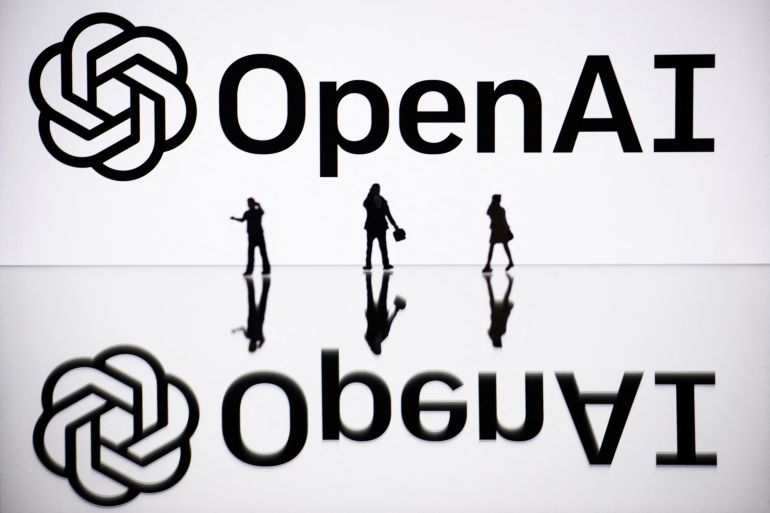 646-1763484342 This illustration photograph taken on October 30, 2023, in Mulhouse, eastern France, shows figurines next to a screen displaying a logo of OpenAI, a US artificial intelligence organisation. (Photo by SEBASTIEN BOZON / AFP)
