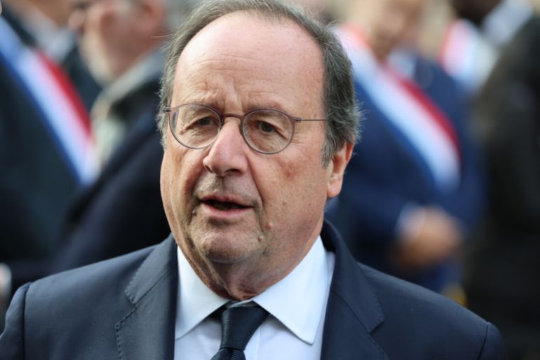 afp_6915c2858fe0-1763033733 Socialistes et Apparentes' MP Francois Hollande arrives to attend a ceremony paying tribute to victims outside the Stade de France stadium in Saint-Denis on November 13, 2025 during ceremonies across Paris marking a decade since the terror attacks of November 13, 2015 in which 130 civilians were killed. (Photo by Ludovic MARIN / POOL / AFP)