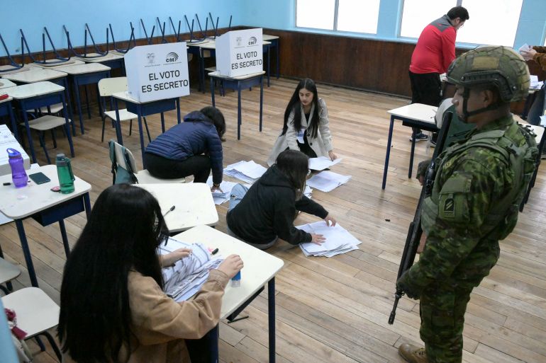 afp_691abb720b08-1763359602 Electoral staffers count votes during the Ecuador's referendum in Quito on November 16, 2025.