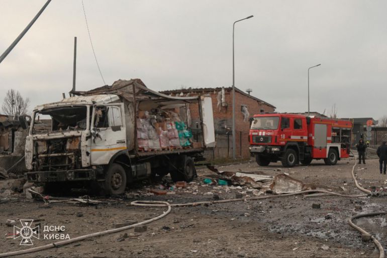 afp_69258e822e76-1764068994 In this handout photograph taken and released by the Ukrainian Emergency Service on November 25, 2025, Ukrainian law enforcement officers work at the site of an air attack in Kyiv, amid the Russian invasion of Ukraine.