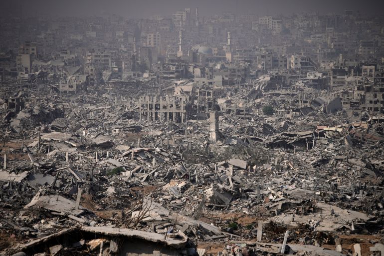 ap_690cdcb1a2f1e-1762450609 Buildings destroyed by the Israeli military are in ruins in the Shijaiya neighborhood of Gaza City, during an army-organized tour for journalists, Wednesday, Nov. 5, 2025. (AP Photo/Ohad Zwigenberg)