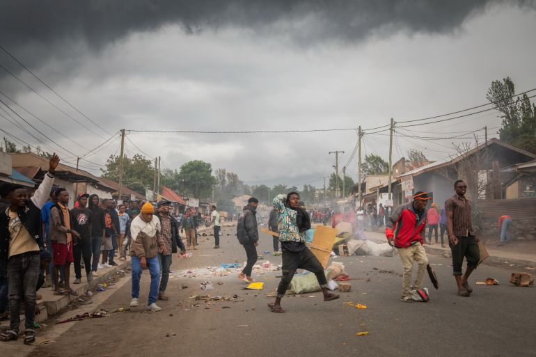 ap_69142c794db28-1762929785-1 FILE - People protest a day after the general election following allegations of electoral irregularities in Arusha, Tanzania, Oct. 30, 2025. (AP Photo, File)