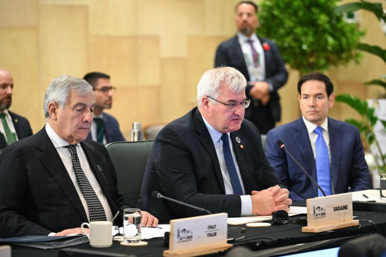 CORRECTS SPELLING TO SYBIHA NOT SYBIGA Ukraine's Foreign Minister Andriy Sybiha, center, speaks alongside US Secretary of State Marco Rubio, right, and Italy's Foreign Minister Antonio Tajani during a G7 Session on Ukraine and Defense Cooperation during the G7 Foreign Ministers Meeting at the White Oaks Resort in Niagara-on-the-Lake, Canada, Wednesday, Nov. 12, 2025. (Mandel Ngan/Pool Photo via AP)