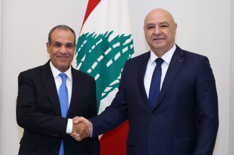 In this photo released by the Lebanese Presidency press office, Lebanese President Joseph Aoun, right, shakes hands with Egyptian Foreign Minister Badr Abdelatty at the presidential palace in Baabda, east of Beirut, Lebanon, Wednesday, Nov. 26, 2025. (Lebanese Presidency press office via AP)