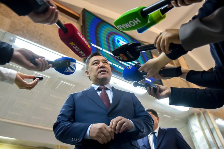 In this photo provided by Kyrgyzstan's Presidential Press Office, Kyrgyz President Sadyr Japarov speaks to the media after voting at a polling station, during the parliamentary elections, in Bishkek, Kyrgyzstan, Sunday, Nov. 30, 2025. (Sultan Dosaliev,Kyrgyzstan's Presidential Press Office via AP)