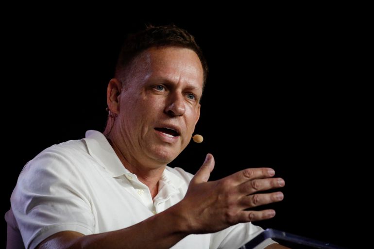 MIAMI, FLORIDA - APRIL 7: Peter Thiel, co-founder of PayPal, Palantir Technologies, and Founders Fund, gestures as he speaks during the Bitcoin 2022 Conference at Miami Beach Convention Center on April 7, 2022 in Miami, Florida. The worlds largest bitcoin conference runs from April 6-9, expecting over 30,000 people in attendance and over 7 million live stream viewers worldwide. Marco Bello/Getty Images/AFP (Photo by Marco Bello / GETTY IMAGES NORTH AMERICA / Getty Images via AFP)