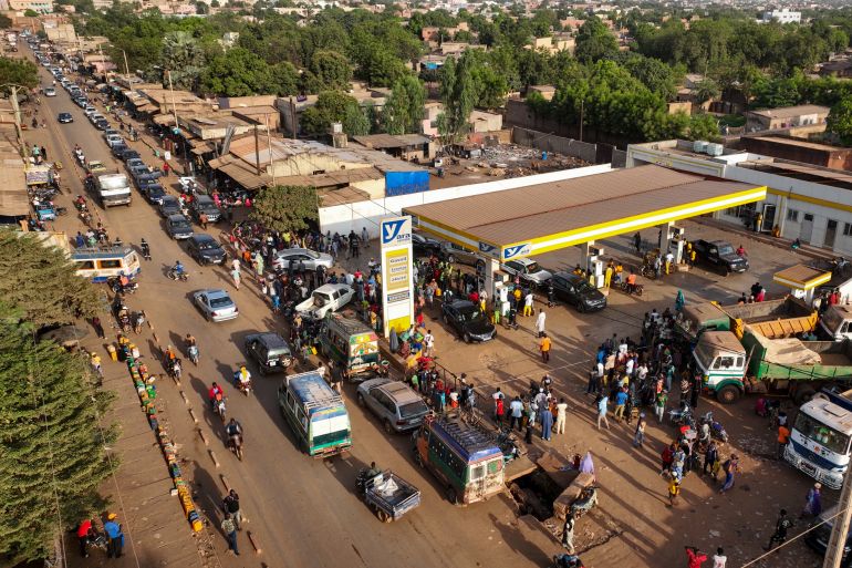 epaselect epa12496759 People line up to fill the tanks of their vehicles at a fuel station in Bamako, Mali, 31 October 2025 (issued on 01 November 2025). Since September, Bamako has faced fuel shortages caused by a blockade on the routes used by fuel tankers in Mali by the Group for the Support of Islam and Muslims (JNIM), an organization affiliated with al-Qaeda. EPA/HADAMA DIAKITE